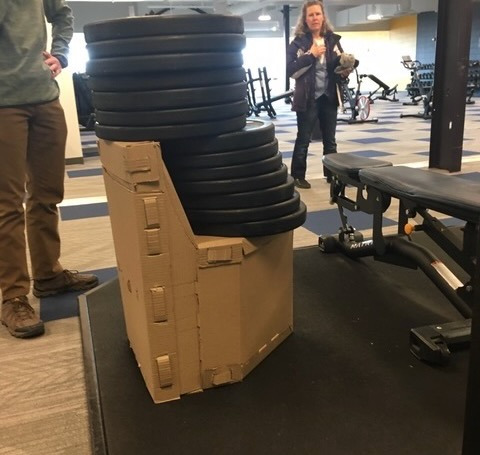 Testing my cardboard chair with 630 pounds!