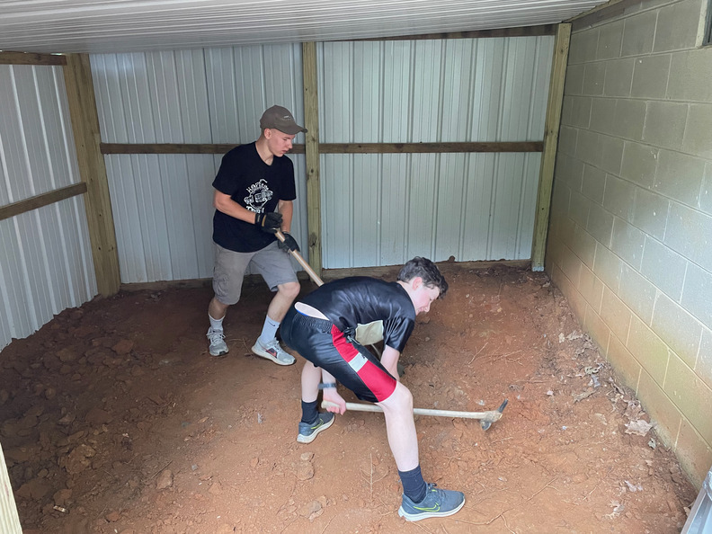 Leveling the ground in Josh’s shed