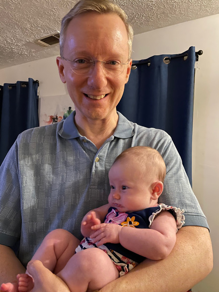 Holding 2-month-old Angie Marie