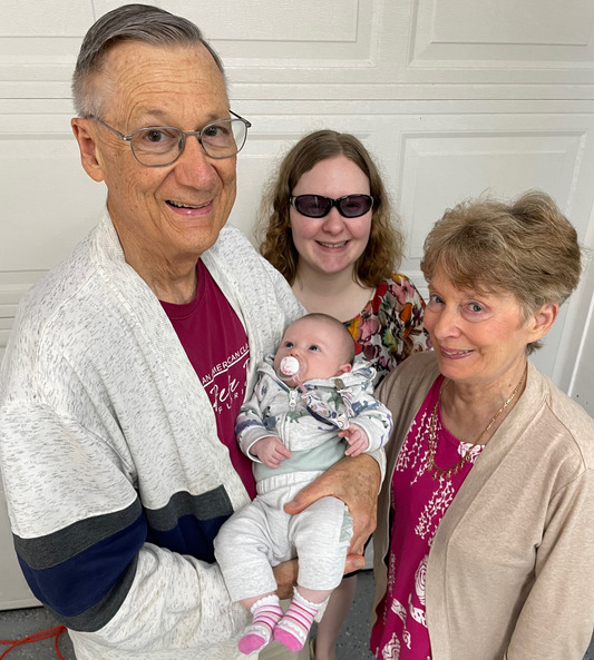 2-month-old Angie with Great-grandpa Ron, Great-grandma Dianne, and Elizabeth