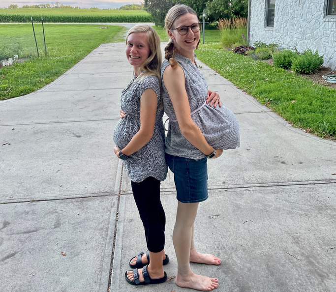 Hannah 27 weeks pregnant with Obadiah and Sarah 38 weeks pregnant with Theo