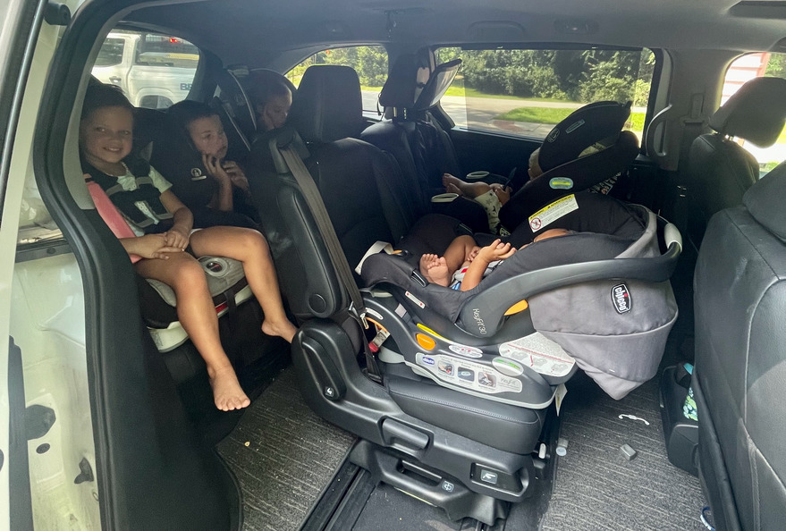 Minivan loaded with children