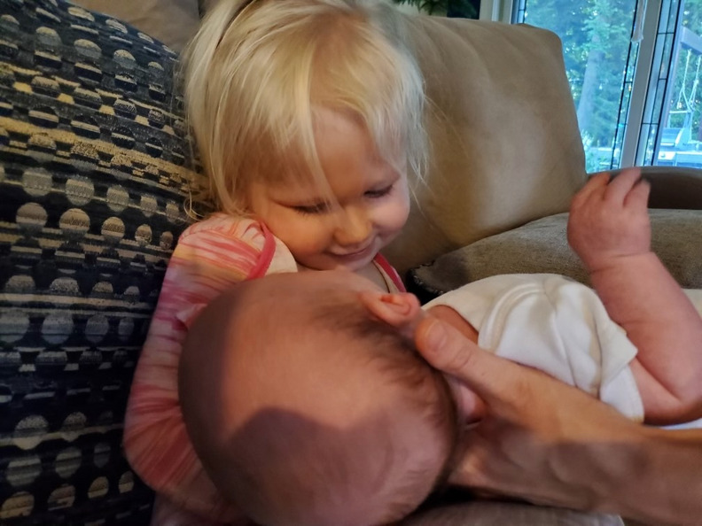 Lottie nursing Theo
