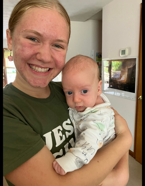 Holding Theo